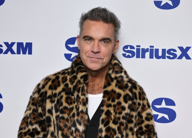 NEW YORK, NEW YORK - JANUARY 15: Robbie Williams visits SiriusXM at SiriusXM Studios on January 15, 2025 in New York City. (Photo by Theo Wargo/Getty Images)